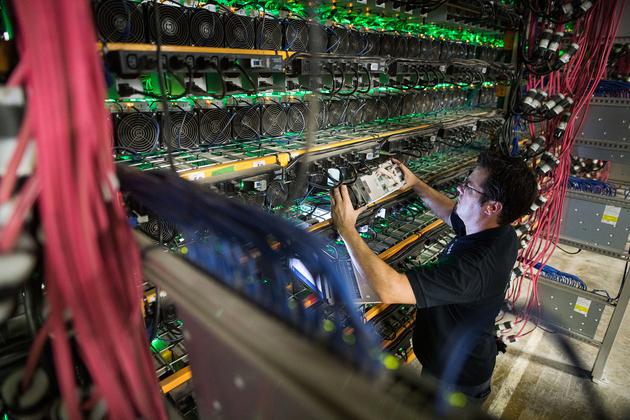 图为比特币矿机 视觉中国图